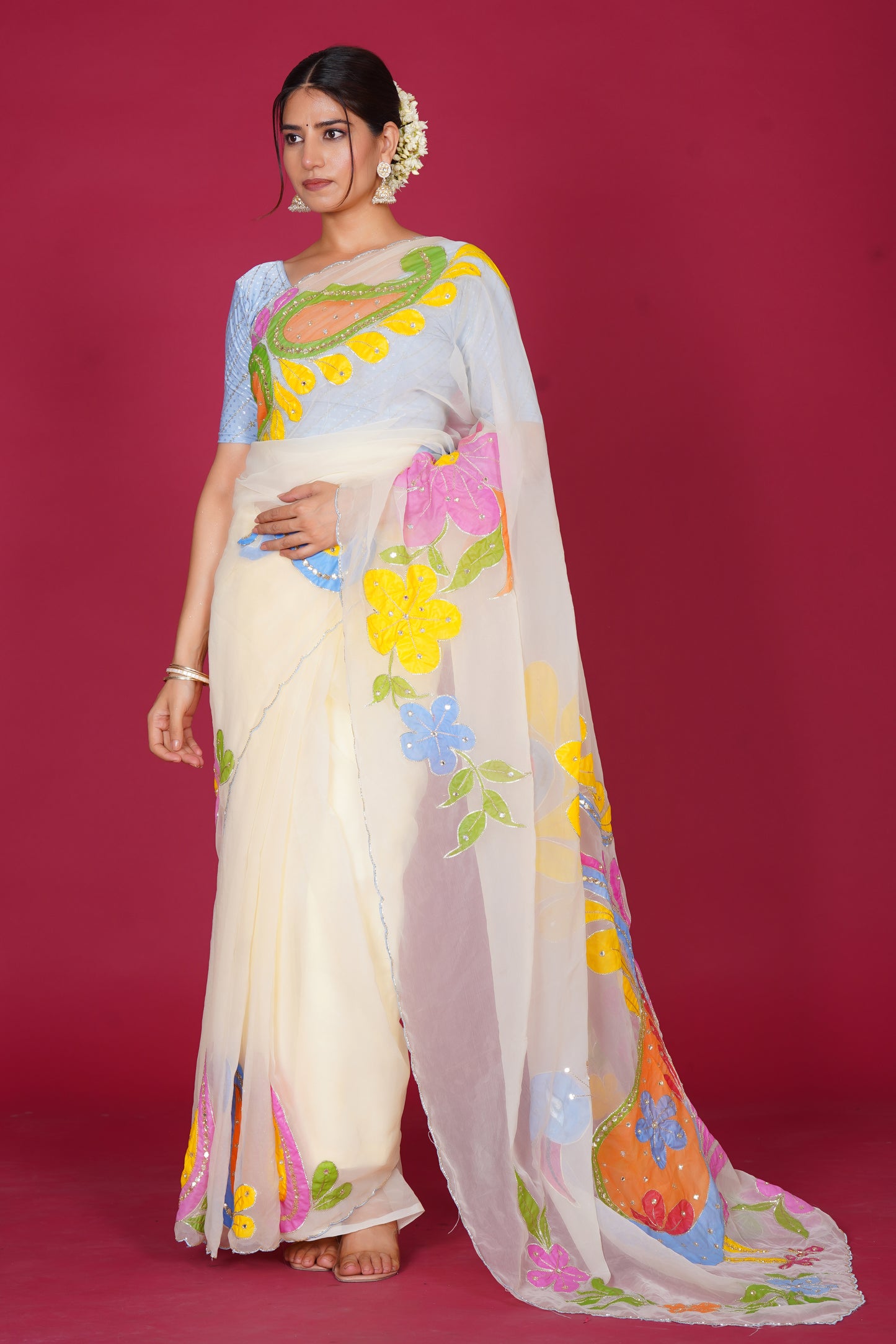 Falguni – White Saree with Peacock Motif