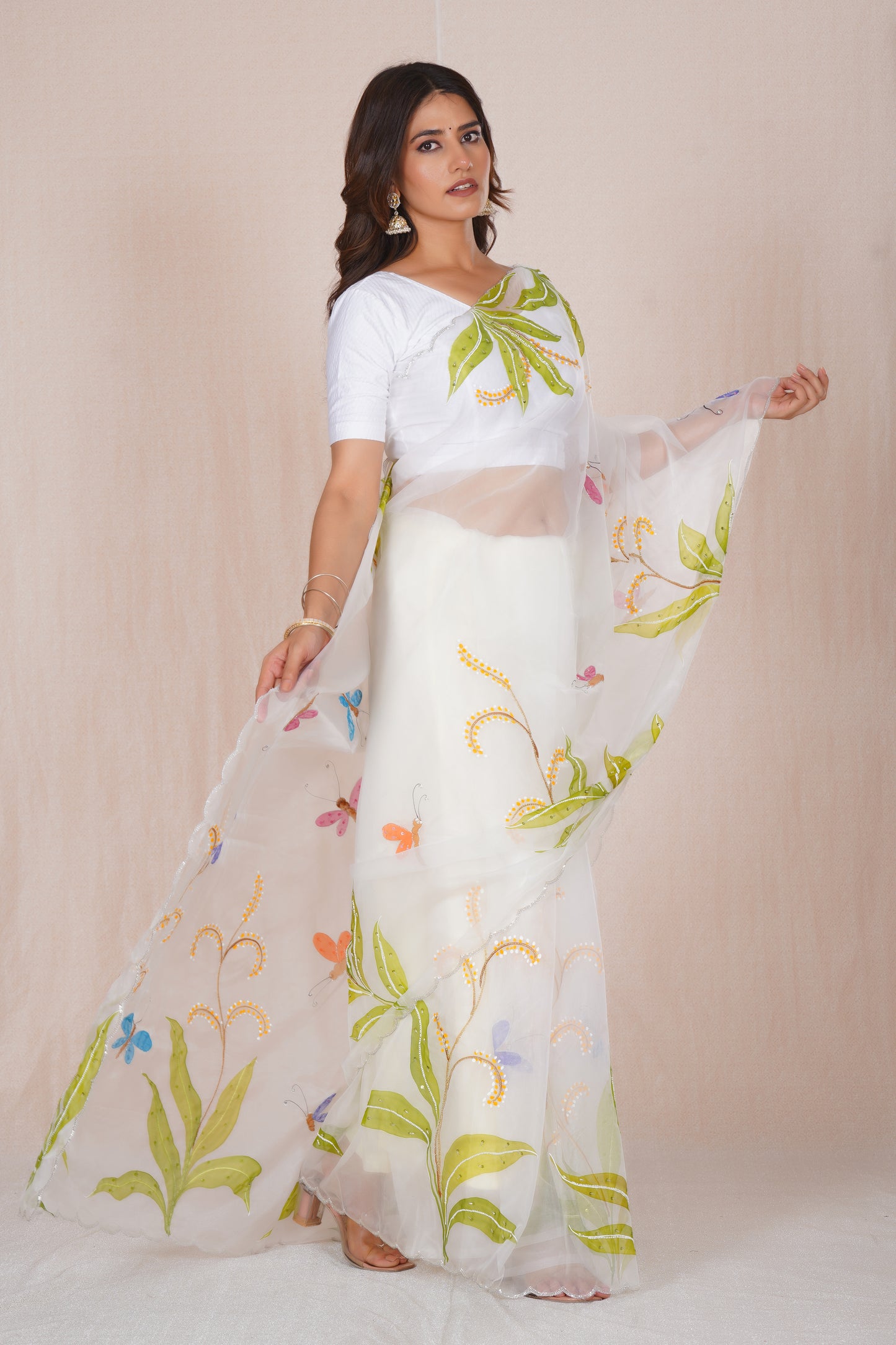 Basant – White Floral Saree with Green Accents