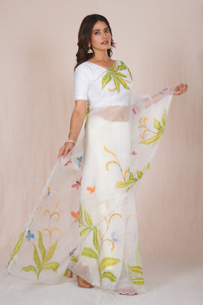 Basant – White Floral Saree with Green Accents