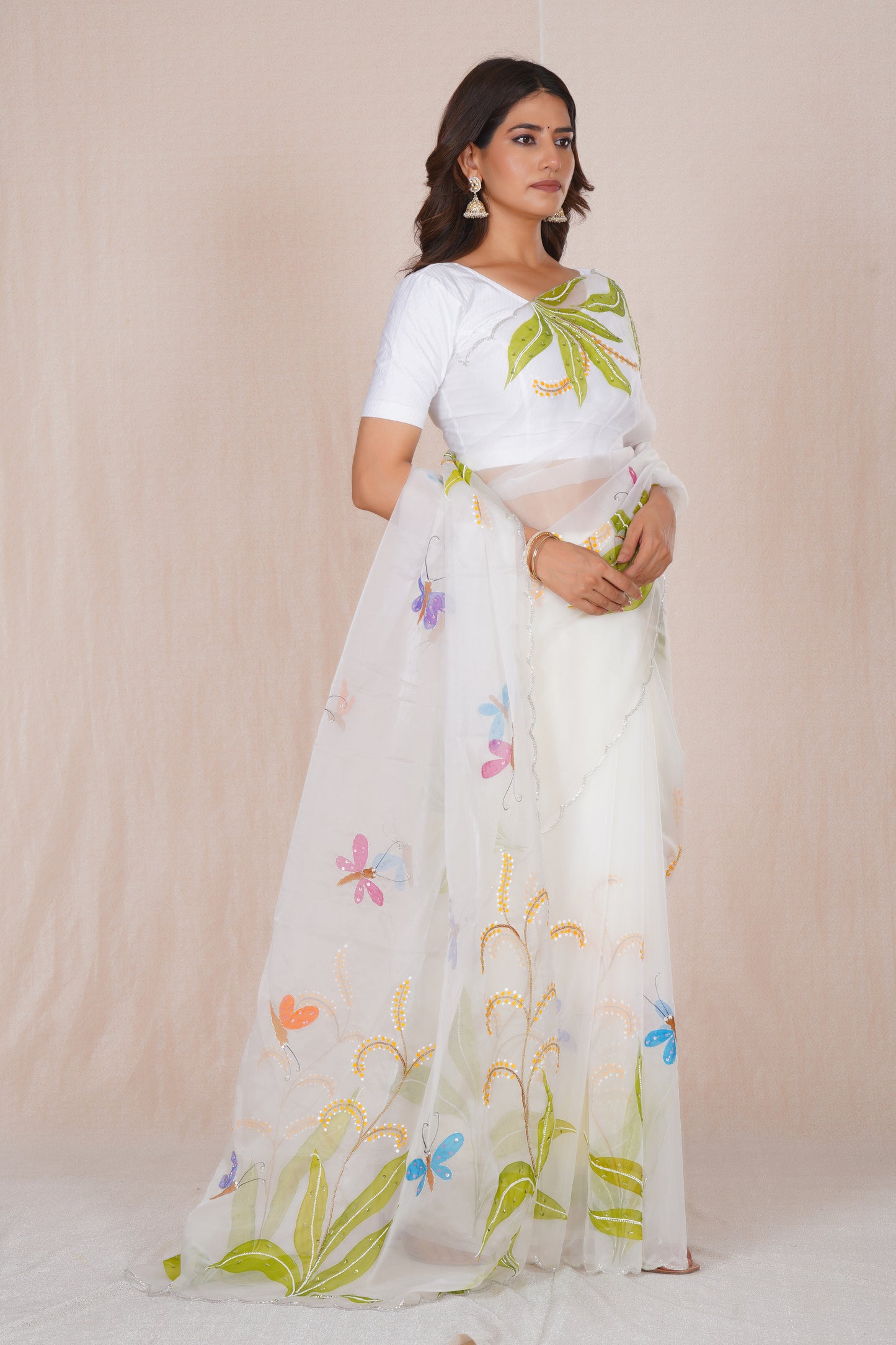 Basant – White Floral Saree with Green Accents