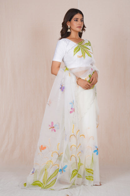 Basant – White Floral Saree with Green Accents