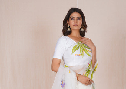 Basant – White Floral Saree with Green Accents