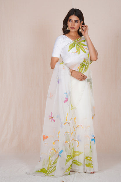 Basant – White Floral Saree with Green Accents